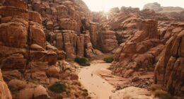 a person walking through a canyon in the desert