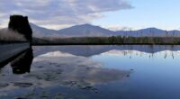 a large body of water surrounded by mountains
