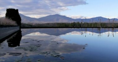 a large body of water surrounded by mountains