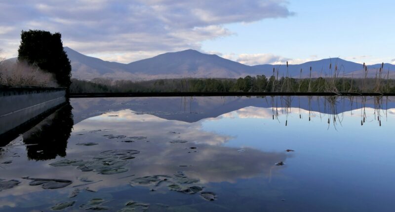 a large body of water surrounded by mountains